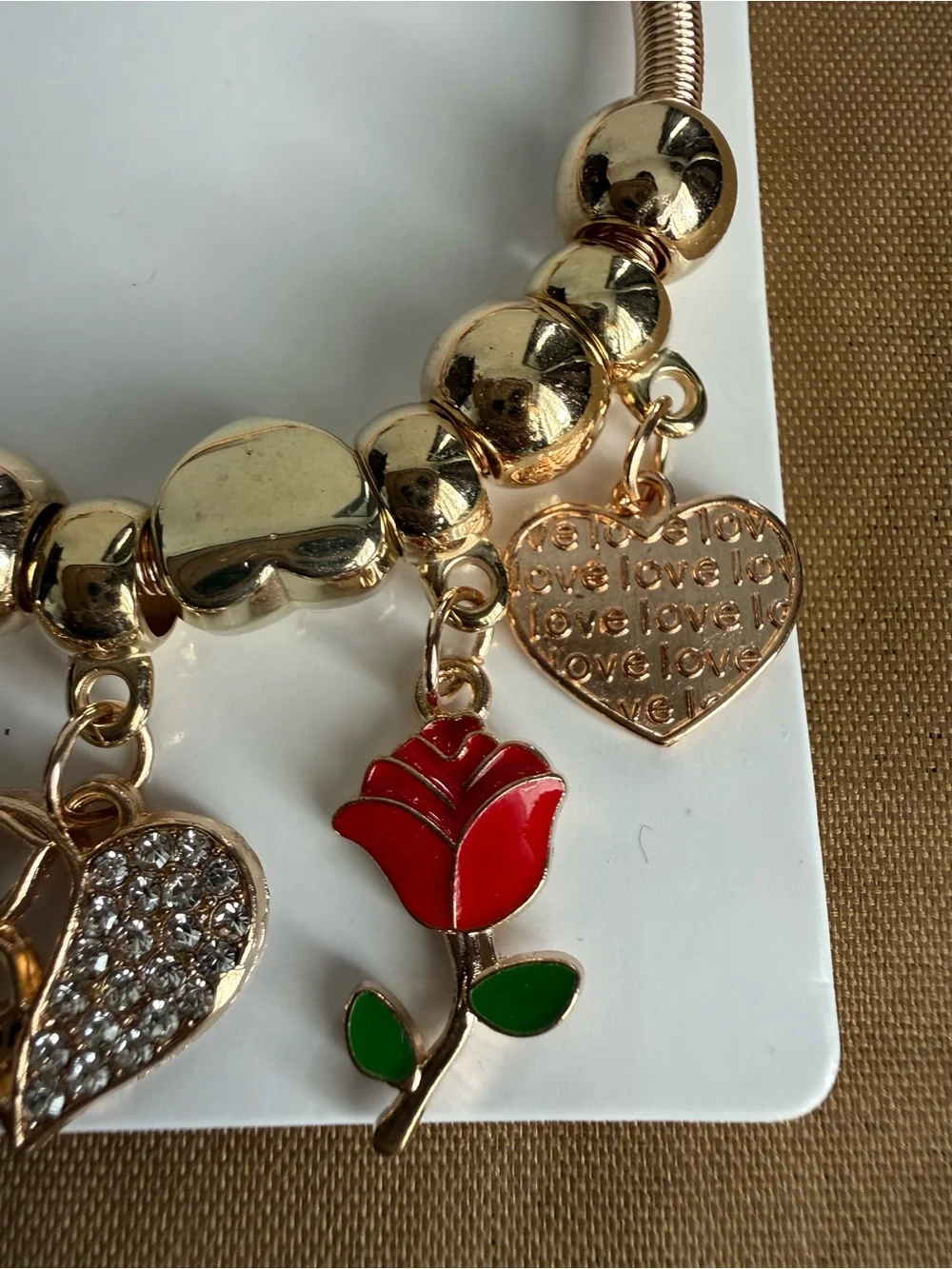 Gold-Tone Charm Bracelet with Red Rose and Heart Charms